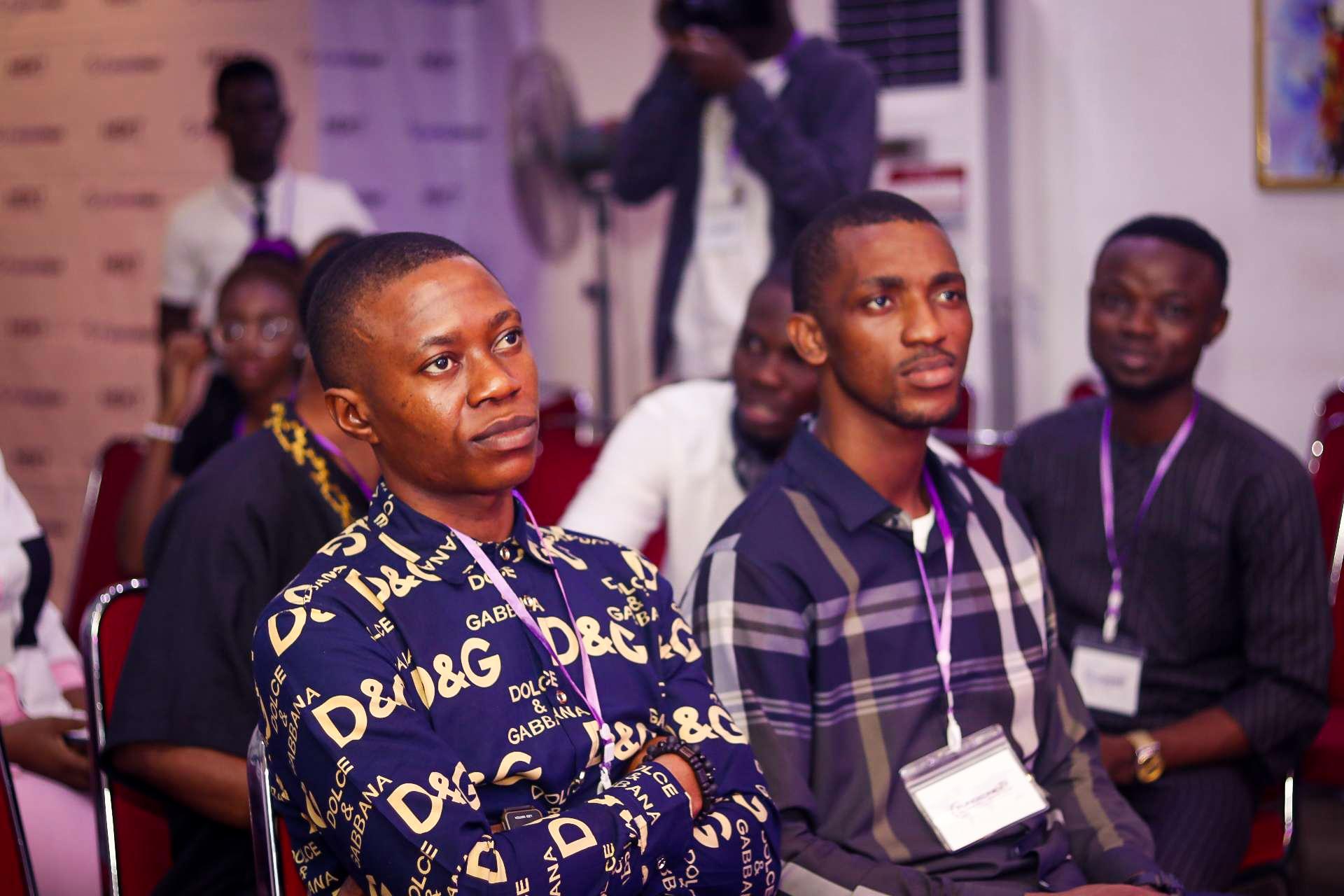 FundedNext Traders at Conference Sitting in Audience